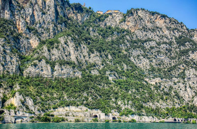 Scenic view of sea against mountain