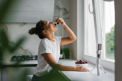 Female nutritionist blogger leads a live broadcast or video conference