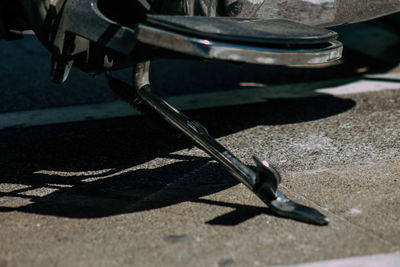 Low section of shoes on street