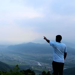 Rear view of man looking at view