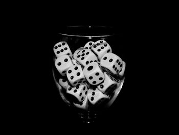 Close-up of glasses on black background