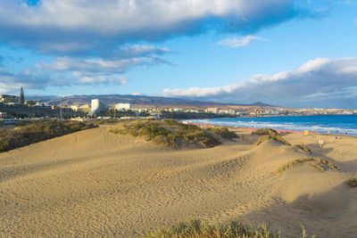 Scenic view of beach against sky