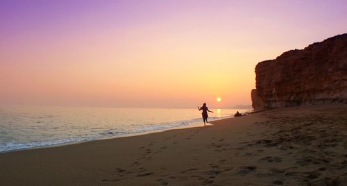 Scenic view of sunset over sea