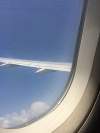 Cropped image of airplane wing