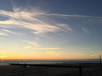 Scenic view of sea against sky at sunset