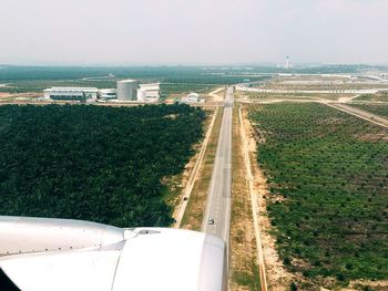 Road passing through field