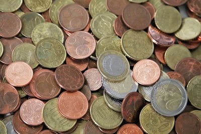 High angle view of coins