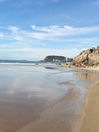 Scenic view of beach against sky