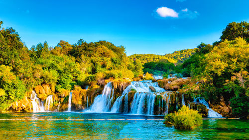 Scenic view of river against sky