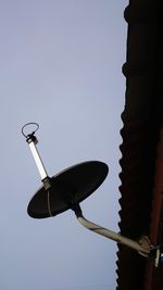 Low angle view of street light against sky