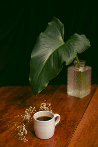 Close-up of coffee cup on table