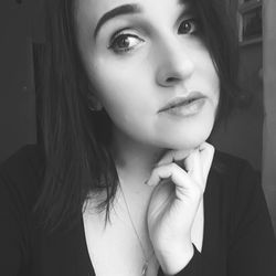 Close-up portrait of a smiling young woman