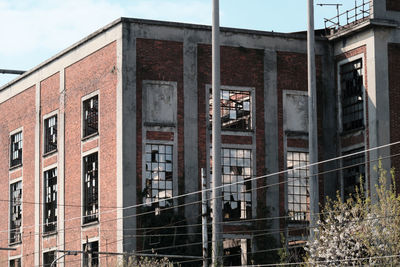 Low angle view of old building against sky