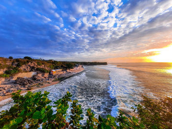 Scenic view of sea against sky during sunset