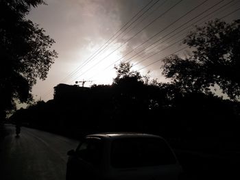 Car on road at sunset
