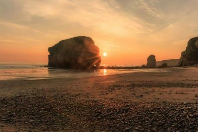 Scenic view of sea during sunset