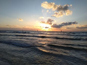 Scenic view of sea against sky during sunset