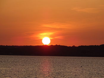 Scenic view of sunset over sea