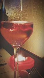 Close-up of red wine on table