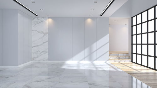 Modern and minimalist interior, marble flooring and blue wall ,empty room 