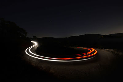 Light trails on road at night