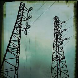 Low angle view of electricity pylon