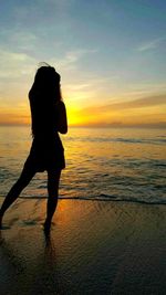 Scenic view of sea at sunset