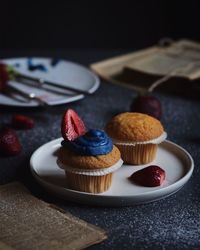 Close-up of cupcakes on table