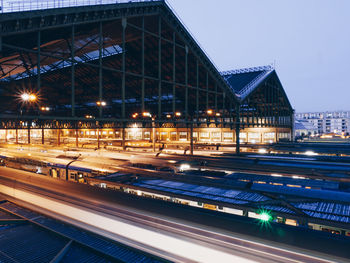 View of railroad station platform at night