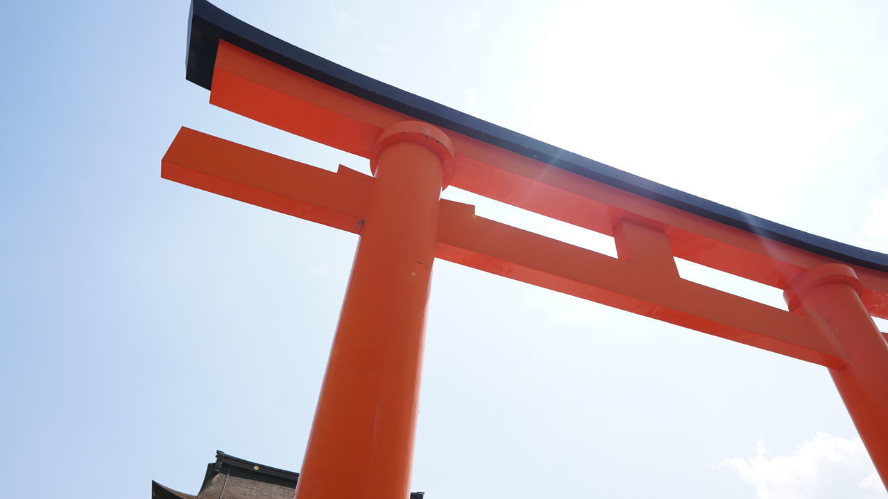 LOW ANGLE VIEW OF RED BRIDGE AGAINST SKY