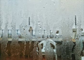 Close-up of water drops on glass