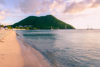 Scenic view of beach against sky