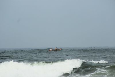 Scenic view of seascape against clear sky