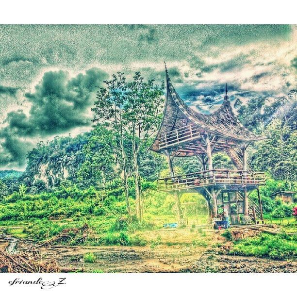 tree, transfer print, sky, built structure, architecture, auto post production filter, bridge - man made structure, cloud - sky, connection, nature, tranquility, scenics, day, mountain, growth, travel destinations, tranquil scene, cloudy, outdoors, famous place