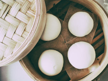 High angle view of eggs in basket on table