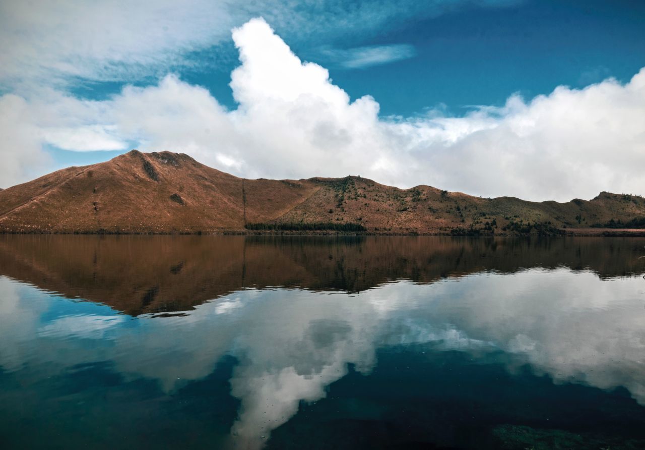 cloud - sky, water, sky, reflection, scenics - nature, beauty in nature, tranquility, lake, mountain, tranquil scene, non-urban scene, nature, day, no people, waterfront, idyllic, blue, outdoors, remote, turquoise colored