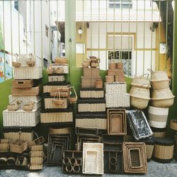 Stack of wicker basket outside building