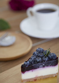 High angle view of cake and coffee on table
