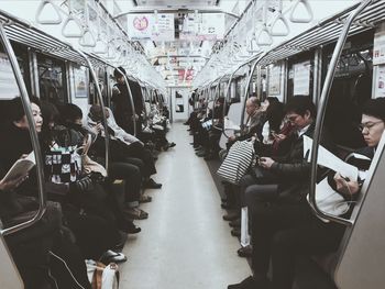 People in illuminated train