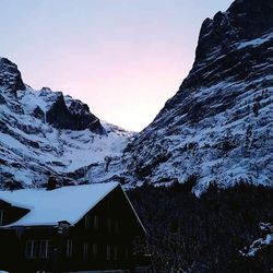 Scenic view of snow covered mountains against sky