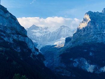Scenic view of snowcapped mountains against sky