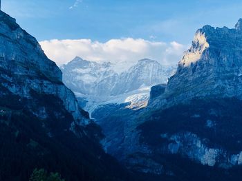 Scenic view of snowcapped mountains against sky