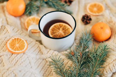 High angle view of orange juice on table