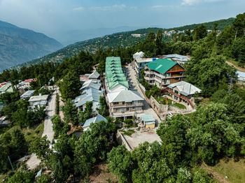 High angle view of townscape against mountain