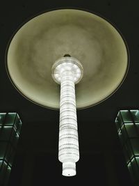 Low angle view of carousel against sky