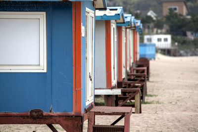 Huts in row at beach