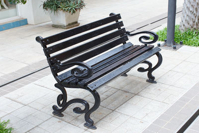 High angle view of bench in park