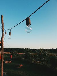 Low angle view of ferris wheel against sky