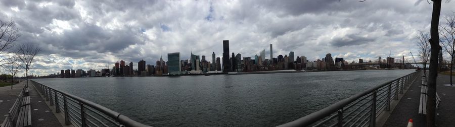 View of city against cloudy sky