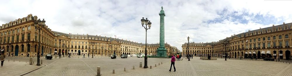 Panoramic view of colonne vendome at town square in city against sky